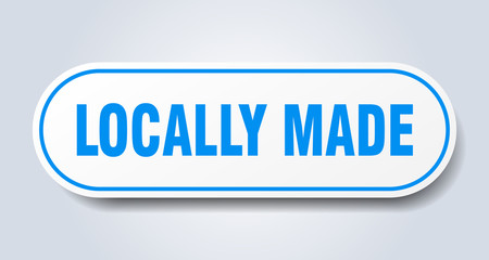 locally made sign. locally made rounded blue sticker. locally made