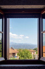 View from the window to the village and mountains