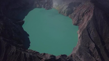 Aerial: Landscape view of Ijen volcano and lake. The most famous tourist attraction in Indonesia