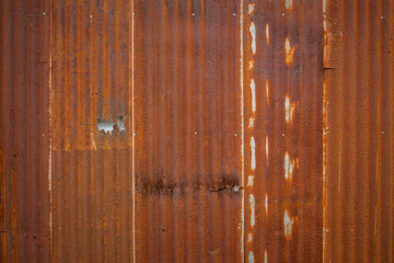 Fototapeta na wymiar Old Zinc rust texture background, close up to pattern texture vertical zinc sheet. Abstract Image of Rusty corrugated metal vintage background view. Wall steel older dirty grunge.