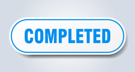 completed sign. completed rounded blue sticker. completed