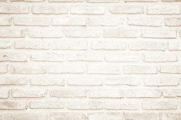Wall cream brick wall texture background in room at subway. Brickwork stonework interior, rock old clean concrete grid uneven abstract weathered bricks tile design.
