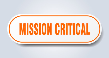 mission critical sign. mission critical rounded orange sticker. mission critical