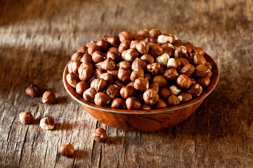 Bunch Of Hazelnuts In A Wooden Bowl