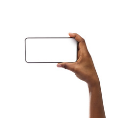 Smartphone With Blank Screen In Black Female Hand