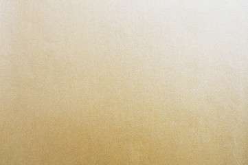 Luxury golden texture. Gold paper matt texture background, gold metal background with place for text