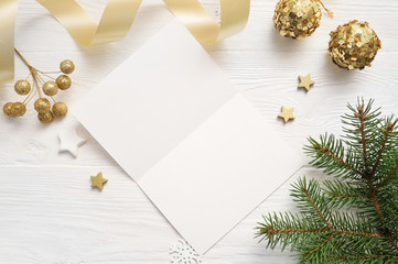 Christmas background for greeting card sheet of paper with place for text. xmas wooden background. Flat lay, top view photo mockup