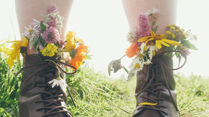 flowers in boots on sunny days