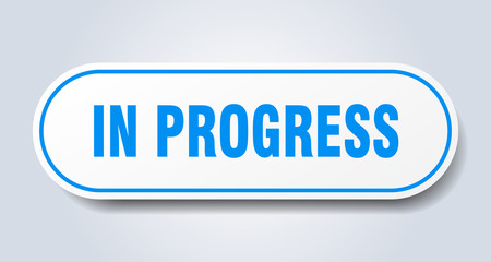 in progress sign. in progress rounded blue sticker. in progress