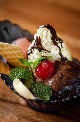 gourmet organic chocolate and strawberry ice cream sundae dessert