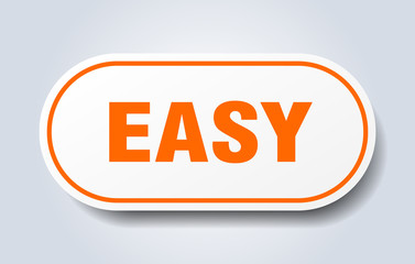 easy sign. easy rounded orange sticker. easy