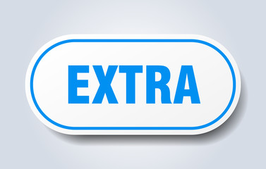 extra sign. extra rounded blue sticker. extra