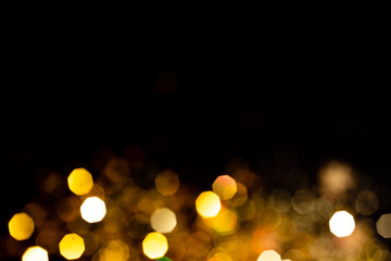 beautiful blurred golden background on black