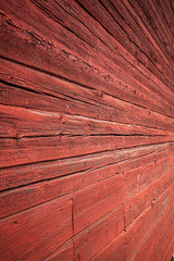 Alte rote Blockhaus Fassade in Schweden. Hintergrund. Background. Old red color wooden facade of swedish farm house.