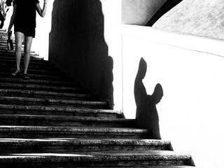 Shadows of people walking on the stairs 2