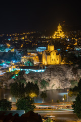 Night view of Tbilisi with Sameba (Trinity) Church and other landmarks. Beautiful Place to travel.