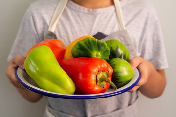 hand holding peppers