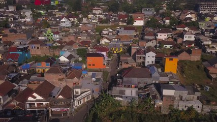 Aerial: Above the roofs at Batu village, Java island, Indonesia 