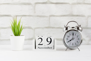 November 29 on the wooden calendar next to the alarm clock, the start date of black Friday