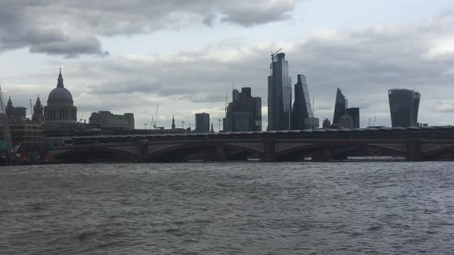 London, UK - Aug 20th 2019: London city cityscape skyline and financial district 'square mile' travel footage bridge view Thames river London, England, UK footage film video landmark stock