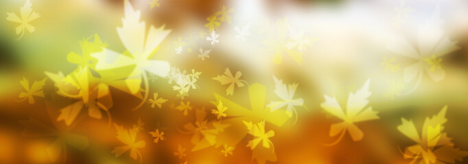 Fototapeta na wymiar Wunderschöner warmer Hintergrund mit Silhouette und tollem goldenem Bokeh von herbstlichen Laubblättern 
