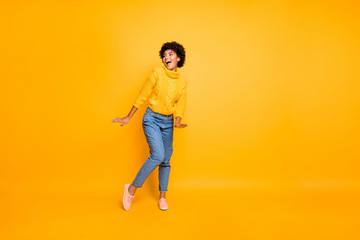 Fototapeta na wymiar Full length body size photo of charming cute nice funny black girlfriend dancing spending her free time wearing jeans denim pullover isolated vivid color background