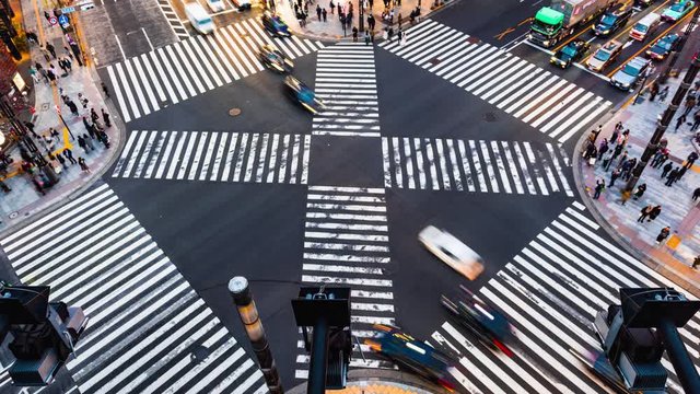 Time lapse People passing the street crossing in Ginza district, Tokyo. Crosswalk. Intersection in Tokyo,Japan