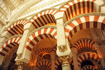 Arab horseshoe arches inside the Mosque of Cordoba (Mezquita de Córdoba) World Heritage Site by Unesco, one of the most famous monuments of Andalusia and Spain