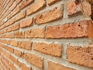 Background of old vintage orange, red and brown brick wall texture