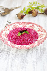 beetroot risotto. in a beautiful porcelain English plate