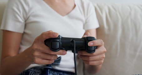 Fototapeta premium Woman play tv game at home