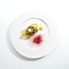Tuna Tartar Made from Raw Fish Served in Avocado