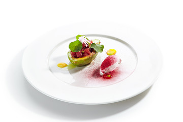 Tuna Tartar Made from Raw Fish Served in Avocado
