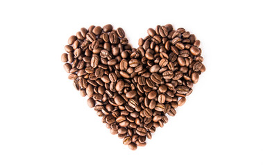 Roasted coffee beans with heart shape on white background