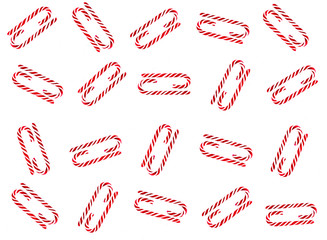Christmas candy cane pattern on white background. Flat lay and top view