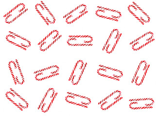 Christmas candy cane pattern on white background. Flat lay and top view