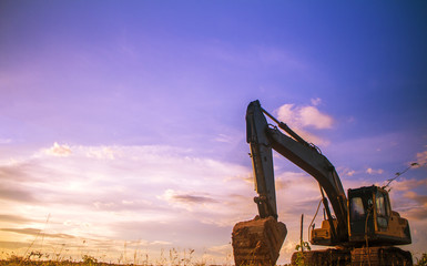yellow excavator at work