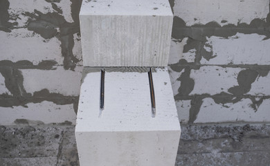 lightweight concrete block, bricks used in the construction of the new series are popular. Reinforcement with iron, metal rods (fittings) supporting walls