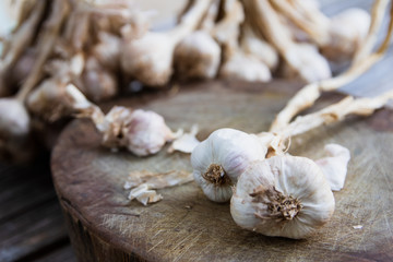 Garlic placed on a wooden table