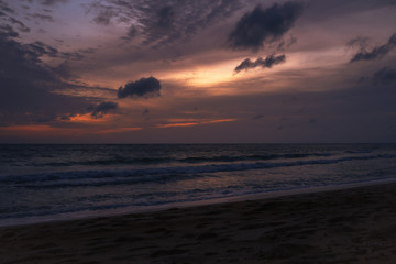 Orange sunset sky with cloud tropical area at Phuket Thailand.
