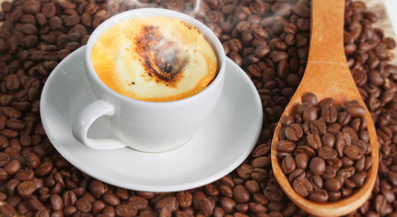Coffee cup and coffee beans