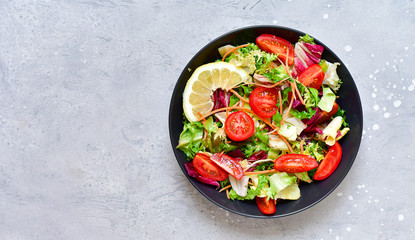 diet lunch fresh vegetables salad from tomato, spinach, lettuce, onion