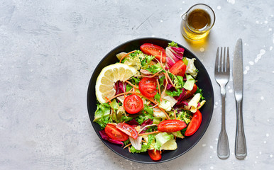 diet lunch fresh vegetables salad from tomato, spinach, lettuce, onion