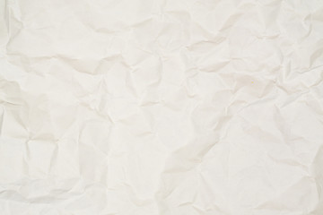 Abstract light brown white crumpled paper texture background