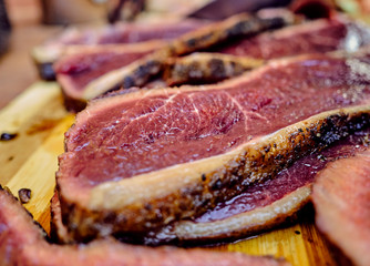 meat on a wooden table, medium raw