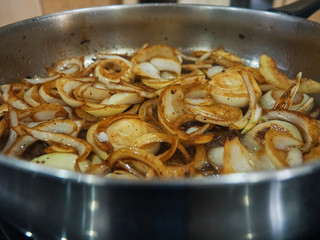 fried pan onions, saute on a steel pan 