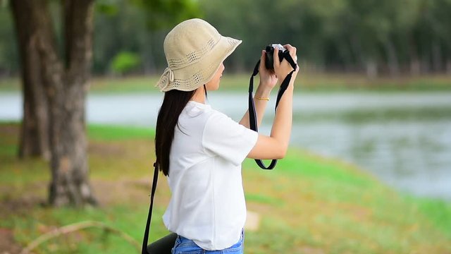 Asian Women camera Travel and Take photo Nature
