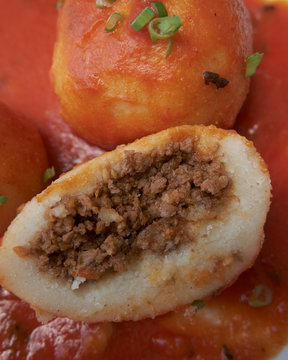 Pelones buns, a traditional Venezuelan meal based on cornmeal and ground meat with tomato sauce. Served at the tables of Venezuelan homes