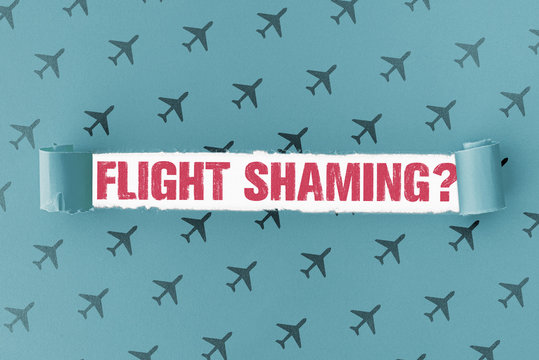 torn paper with text FLIGHT SHAMING in opening