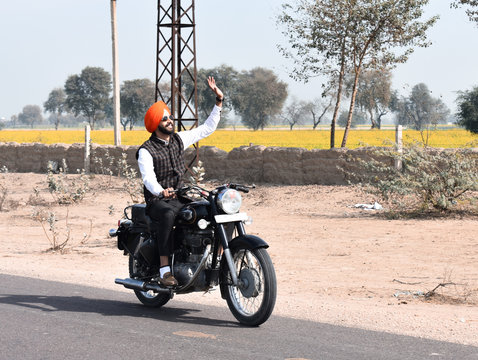 An Indian Punjabi Boy Ride Bullet Bike In Village